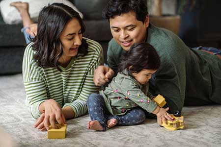 baby safe playing with adoptive parents