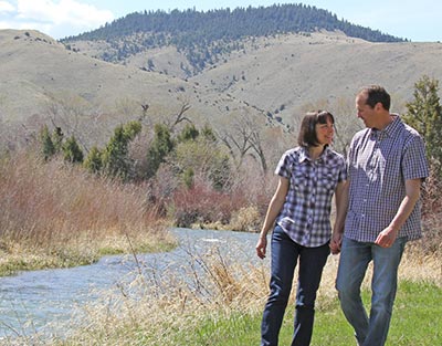couple holding hands in nature
